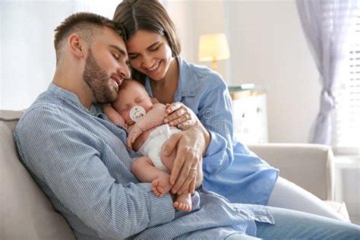 a couple and their baby