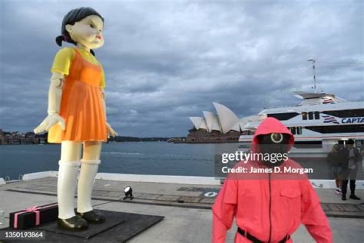 A giant doll during the Red Light Green Light game in Squid Game.