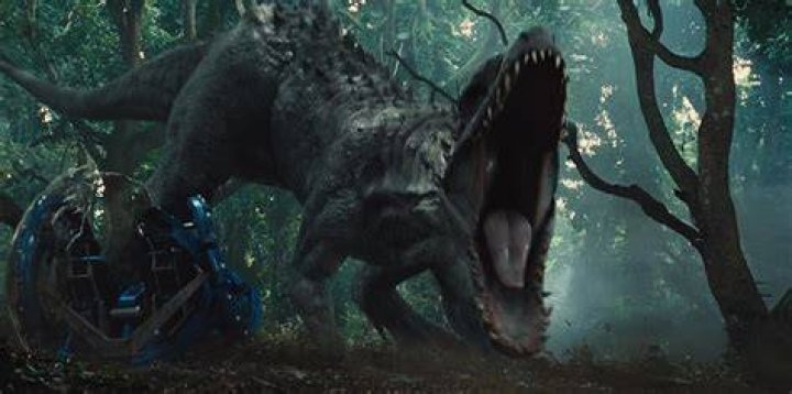 A shot of the Indominus Rex in a pen in Jurassic World: Evolution