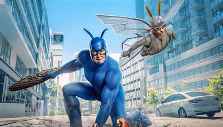 Arthur from The Tick Flying Through the City