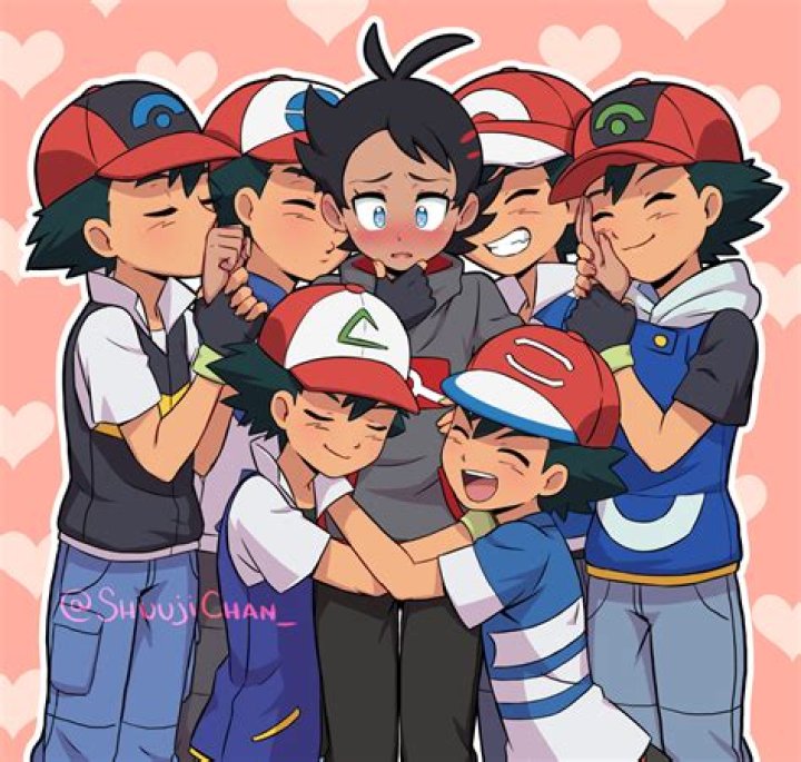 Ash and Goh surrounded by their Pok&eacute;mon in the Pok&eacute;mon Journeys Anime