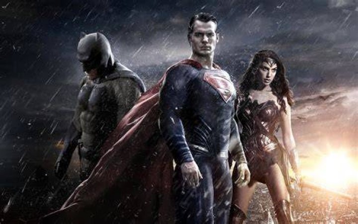 Batman, Superman, and Wonder Woman on a comic cover.