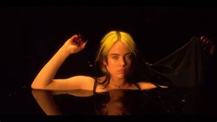 Billie Eilish strips down in shower selfies highlighting her redhot