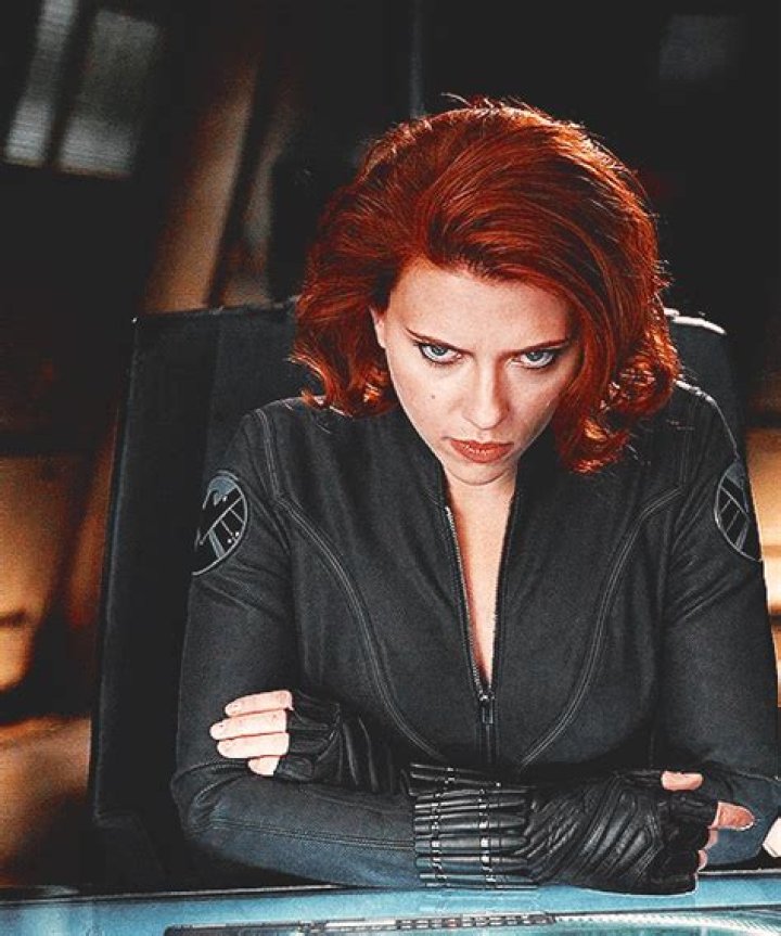 Black Widow leaning on a panel in Captain America Winter Soldier.