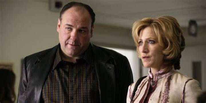 Carmela & Tony stand next to each other in The Sopranos.