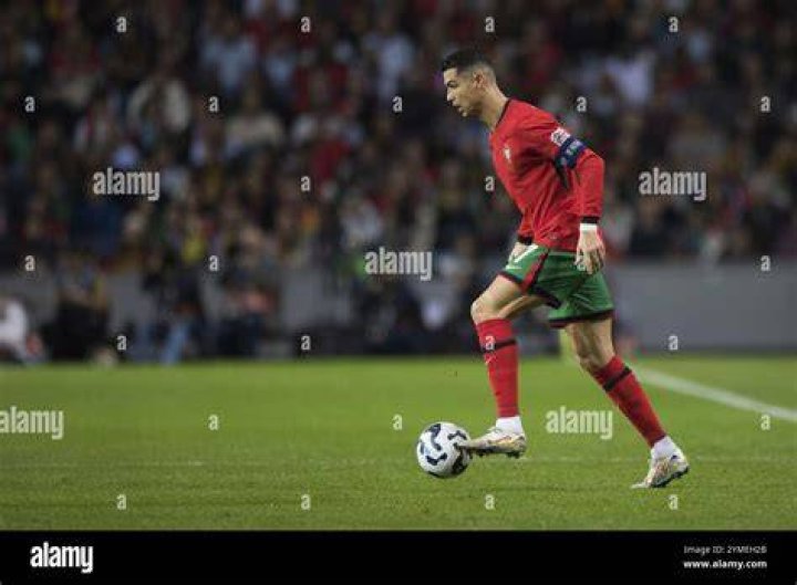 Cristiano Ronaldo of Portugal runs for the ball during their EURO Qualifier match against Iceland