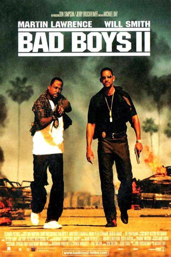 Danny holding Bad Boys 2 and Point Break in Hot Fuzz