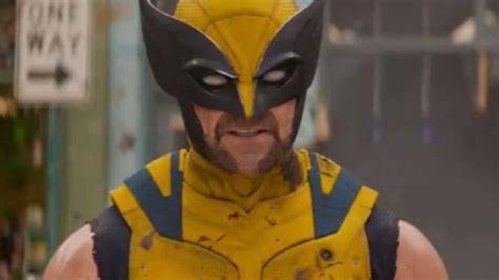 Deadpool wearing Hugh Jackman mask