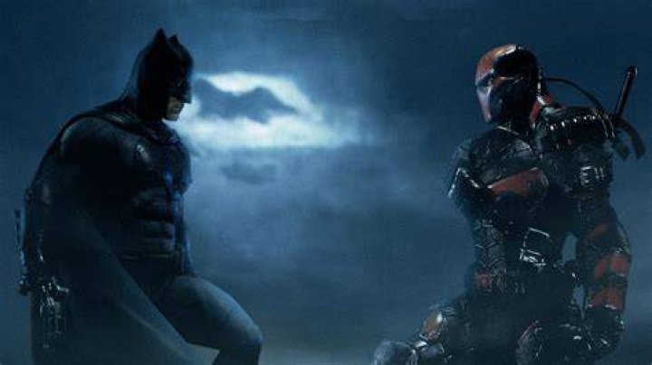 Deathstroke fighting a wounded Batman with a sword in Batman #88