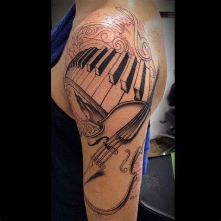 decorated ranked musician tattoo second person song written so