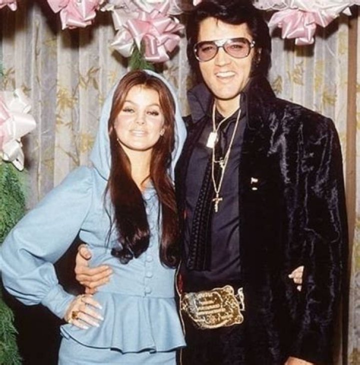 Elvis and Priscilla embrace on their wedding day in Priscilla