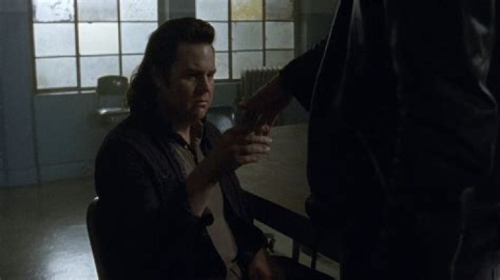 Eugene tries to kiss Negan's hand in The Walking Dead