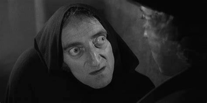 Frankenstein grabbing Igor by the neck in Young Frankenstein