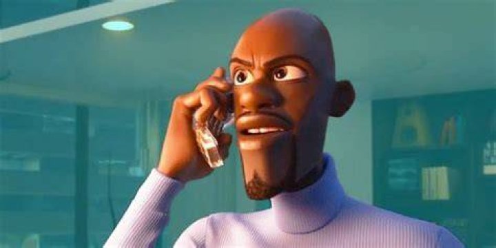 Frozone sees danger and calls for his super suit in The Incredibles