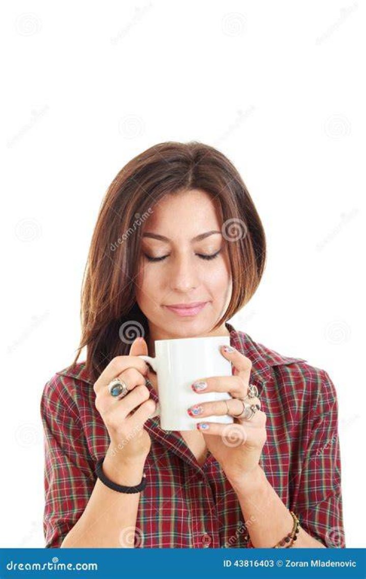 Girl holding a coffee mug