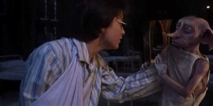 Harry grabs Dobby in the Harry Potter movies