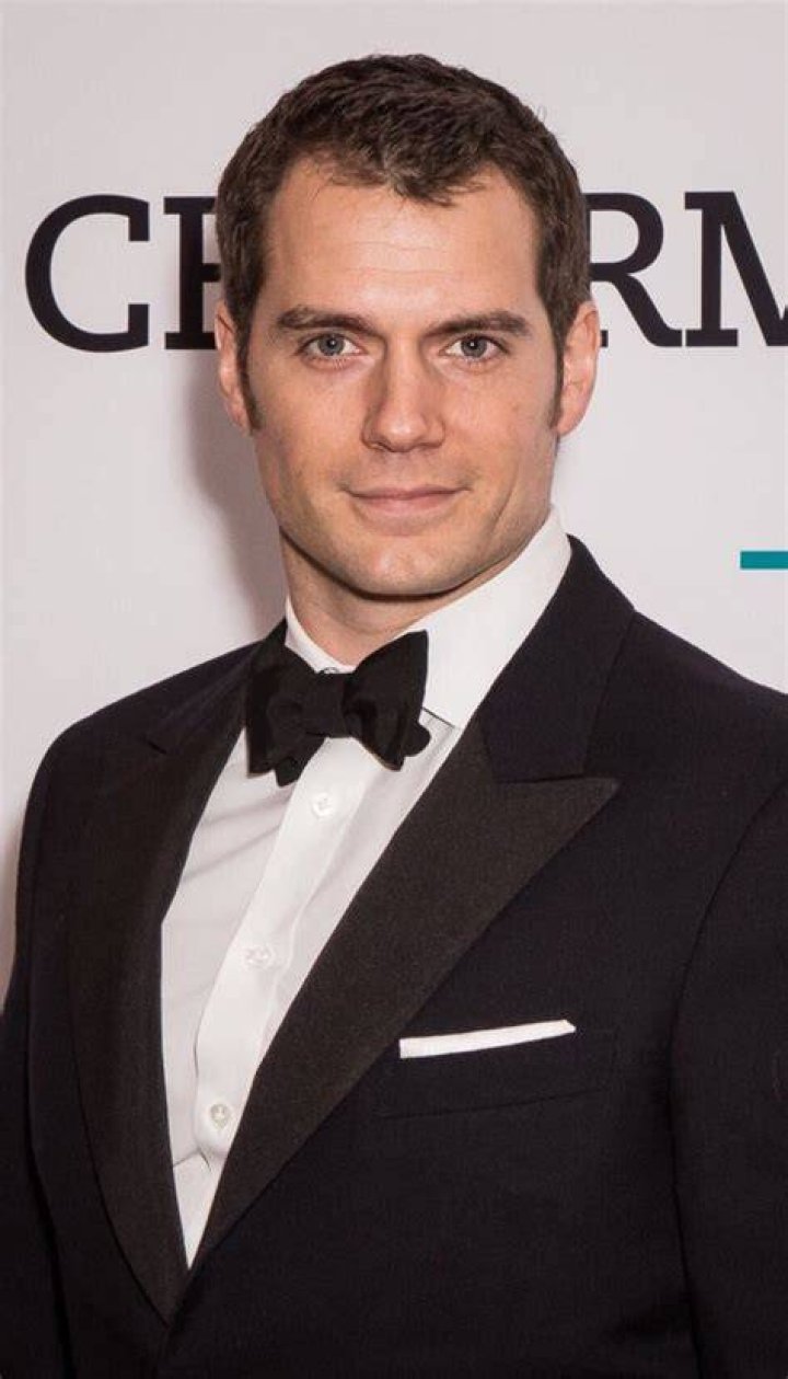 Henry in tux then with Betty in flower dress