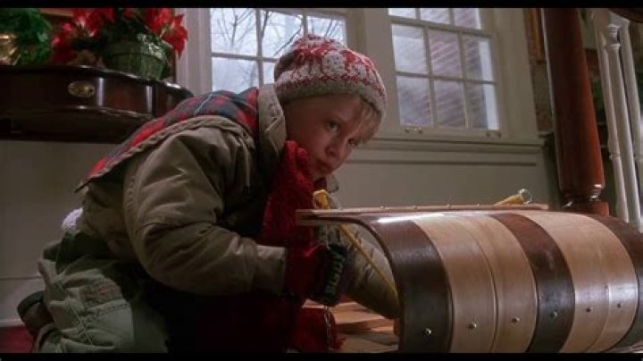 Home Alone - sled ride down stairs