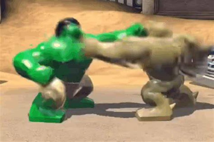 Hulk punches Abomination in the face.