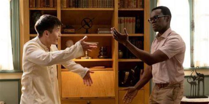 Jason explaining something to Chidi in Chidi's new Good Place house