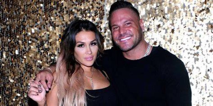 Jen Harley from Jersey Shore smiling slightly