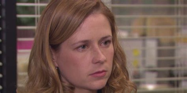 Jenna Fischer as Pam crying after a fight with Jim, being comforted by the doc crew's gaffer, Brian (Chris Diamantopoulos)