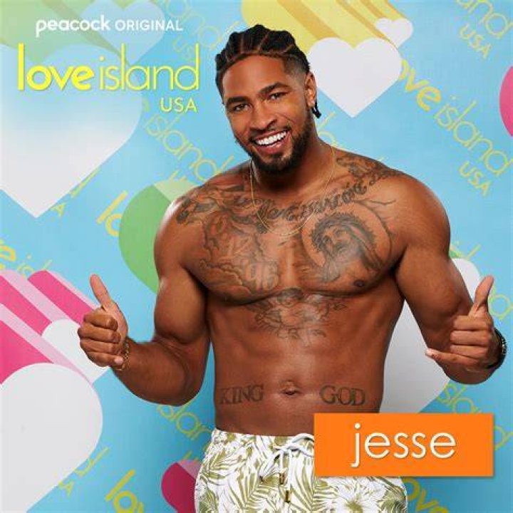 Jesse Bray Love Island USA gray shirt smiling CROPPED