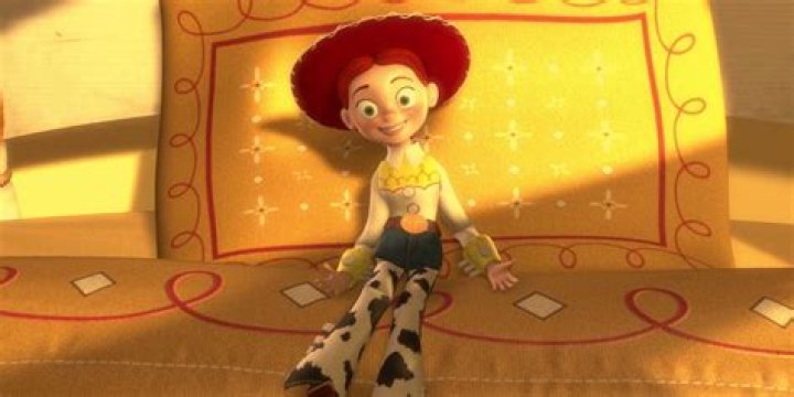 Jessie sitting on Emily's bed in Toy Story 2