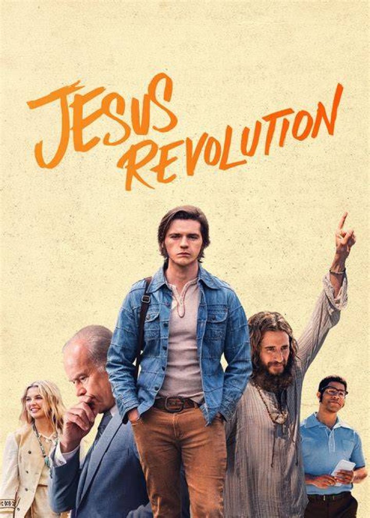 Jesus Revolution poster featurng Greg Laurie walking in center while all other characters stand behind him