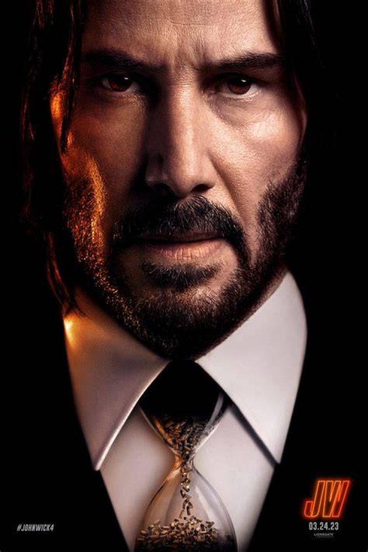 John Wick talks to a dog in the back of a New York taxicab in John Wick Chapter 3 Parabellum