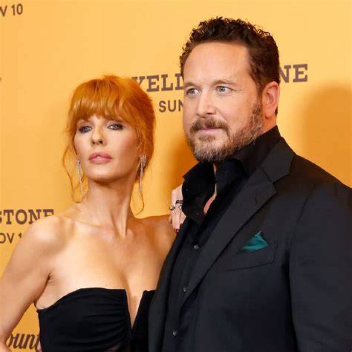 Kelly Reilly standing with her arms crossed with male detectives behind her in Above Suspicion