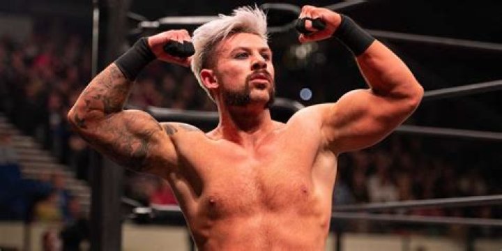 Kip Sabian flexing in the ring 