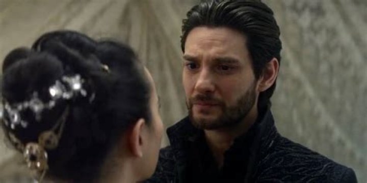 Kirigan looking tearfully at Alina