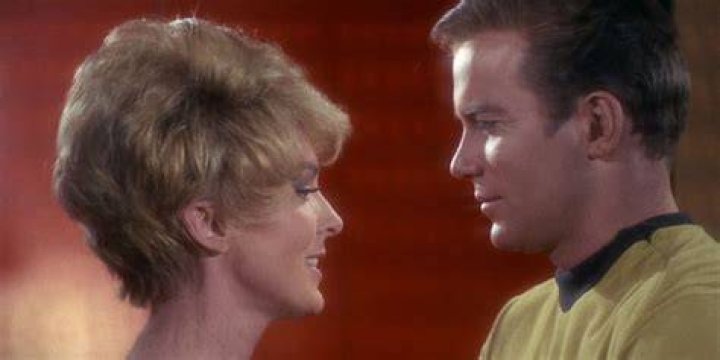 Kirk kisses Areel Shaw on Star Trek