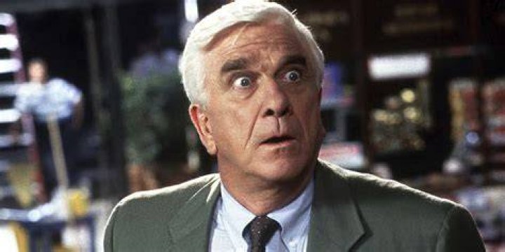 Leslie Nielson as Frank Drebin in The Naked Gun 2 1/2.