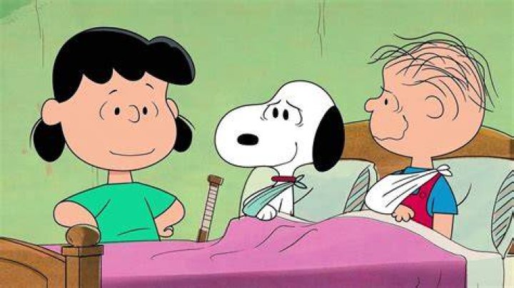 Lucy sitting on a hospital bed teaching Edgar how to pray in Lucy Shimmers and the Prince of Peace