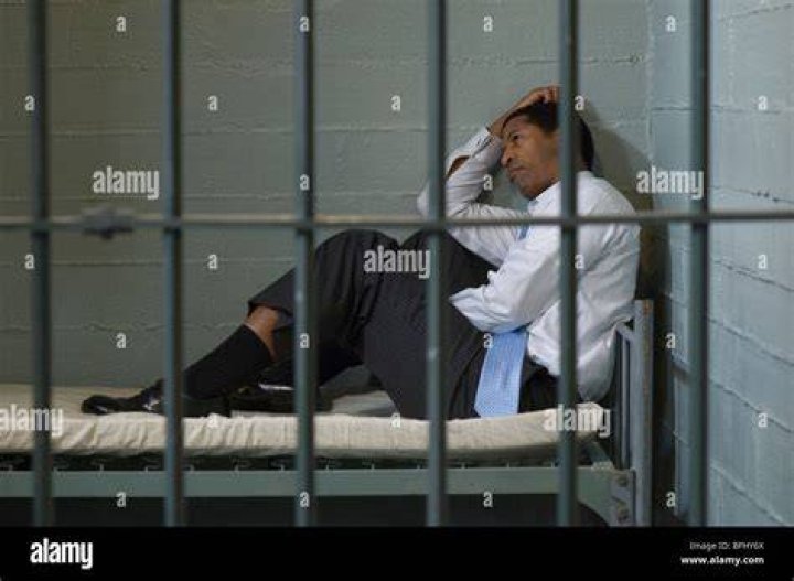 man in a prison cell