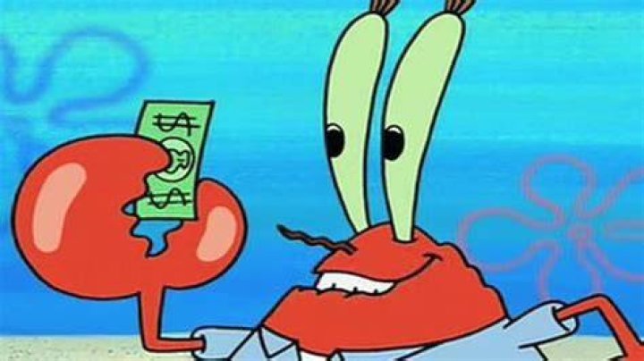 Mr Krabs holding up a Krabby Land poster