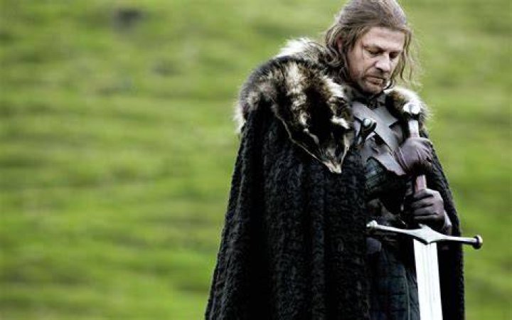 Ned Stark holding his sword in Game of Thrones