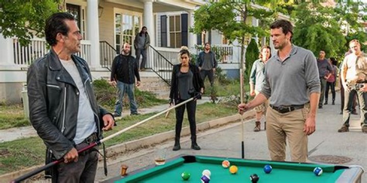 Negan plays pool with Spencer in The Walking Dead