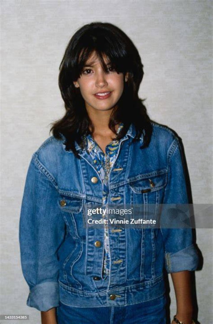 Phoebe Cates smiling in The Anniversary Party