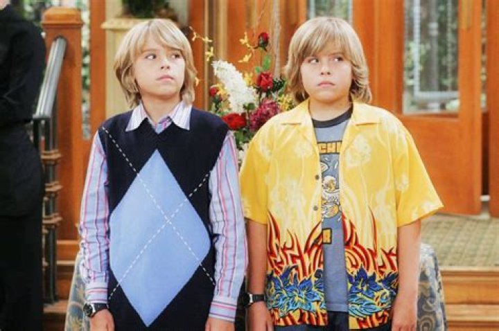 Suite Life of Zack and Cody cast riding on a hotel cart