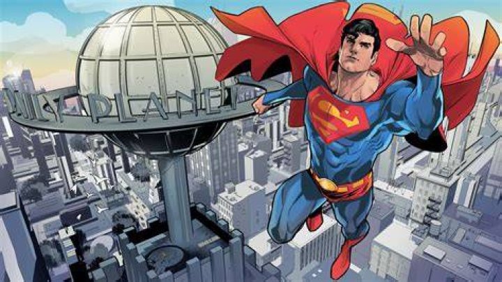 Superman watching over Metropolis on a comic cover.