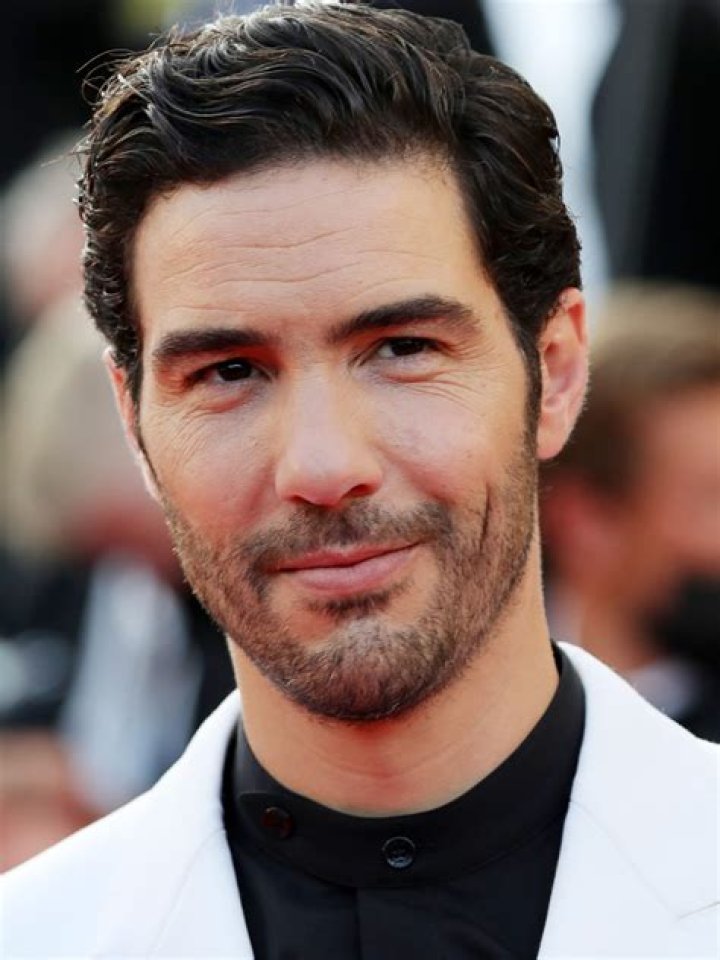 Tahar Rahim looking sideways in The Serpent