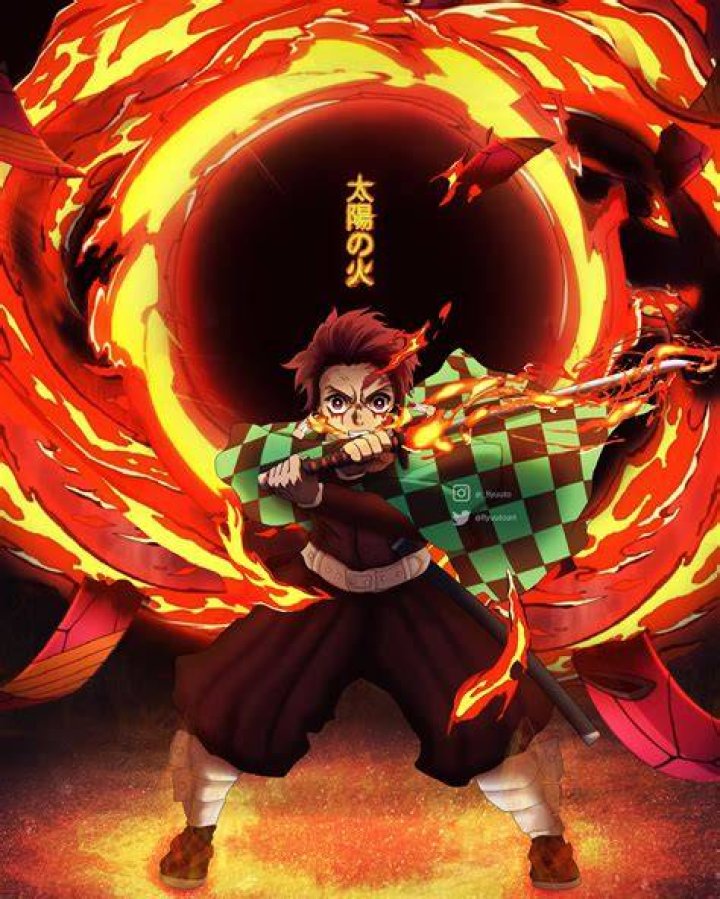 Tanjiro Kamada in Demon Slayer: Kimetsu No Yaiba smiling at camera.