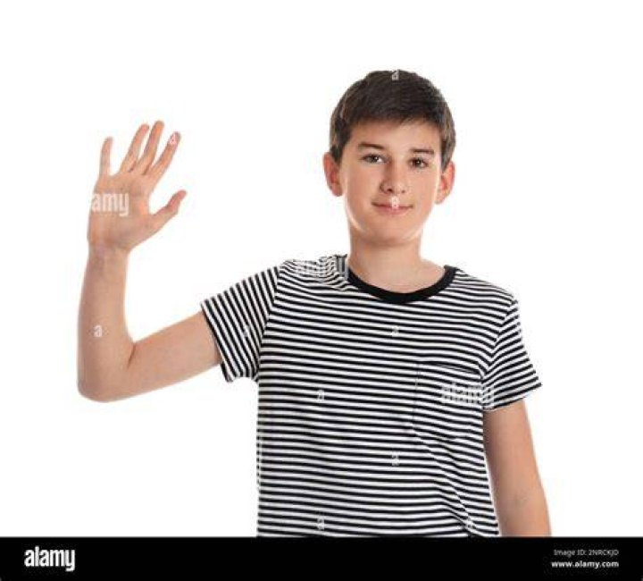 The Boy in White waving in From.