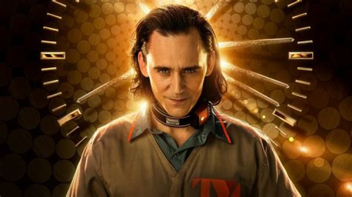 Tom Hiddleston as Loki flaming sword