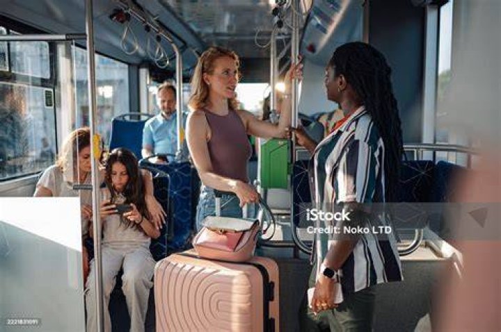 Tourists riding on public transport in Cambodia