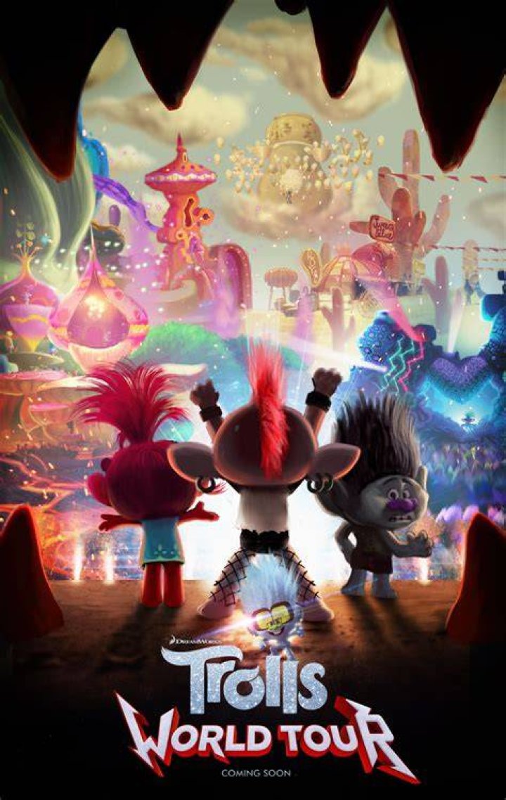 Trolls World Tour art of a troll celebrating around a bunch of raised rock hands.