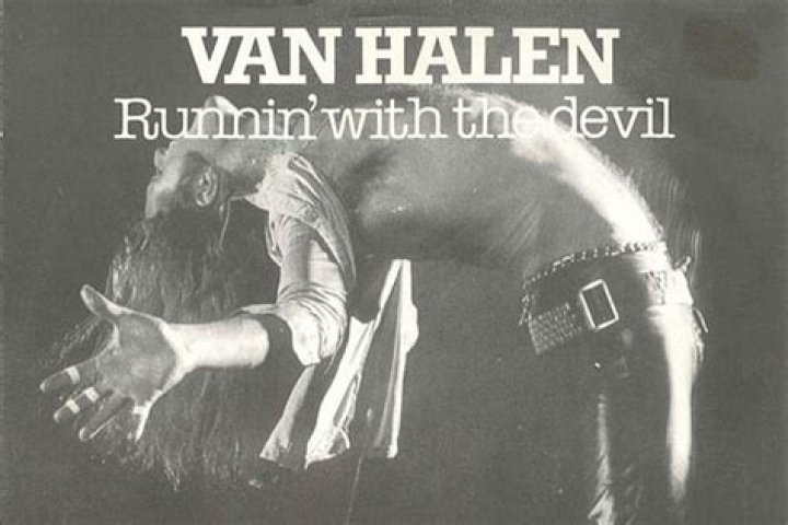 Van Halen - Runnin With The Devil cover image red writing with band posing against wall